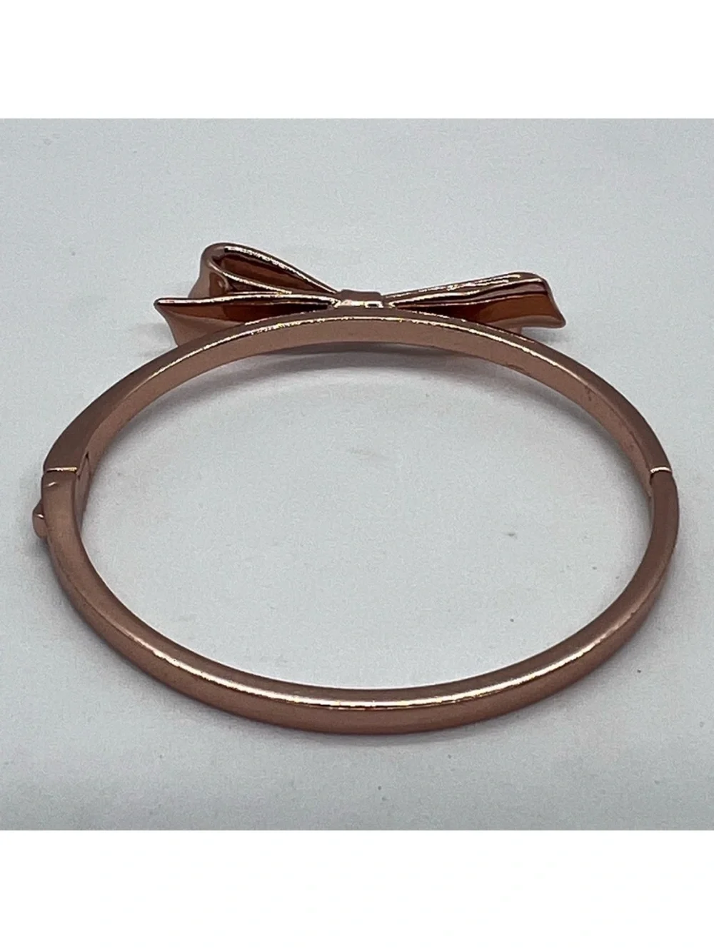 kate spade Rose Gold Bow Bangle Bracelet with dust bag.